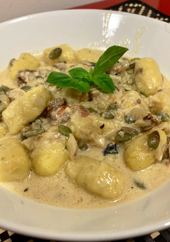 Una foto de Gnocchi en salsa