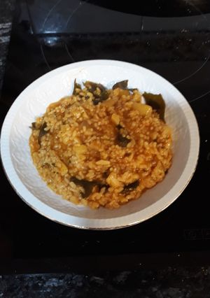 Foto principal de Arroz meloso con tómate frito y bacalao