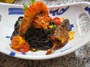 Une photo de spaghetti, crevettes