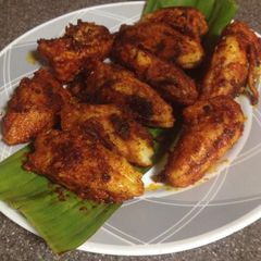 A picture of Arikkadukka... stuffed mussel fry.