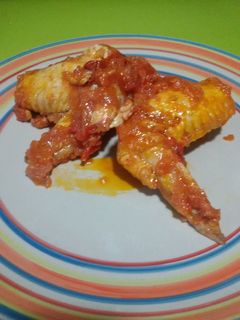 Una foto de Alitas de pollo con tomate con Thermomix