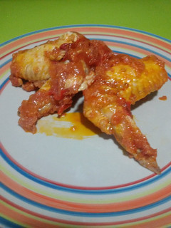 Una foto de Alitas de pollo con tomate con Thermomix