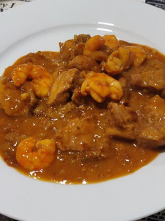 Una foto de Solomillo de cerdo con setas y langostinos en salsa de soja