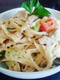 Tagliatelle mit Schnitzel Streifen in Cherry Tomaten Frischkäse Sauce