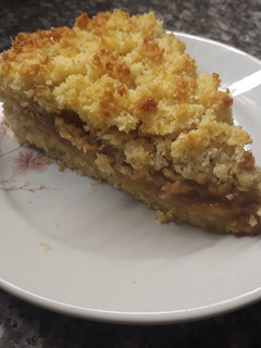 Una foto de Tarta de dulce de leche y coco