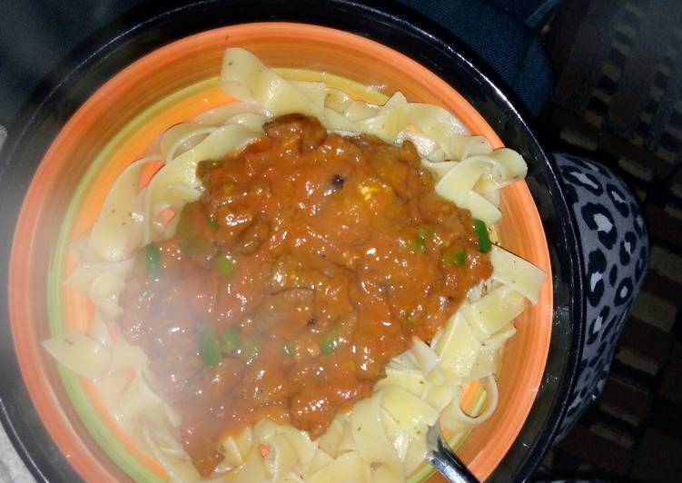 Pasta served with beef curry