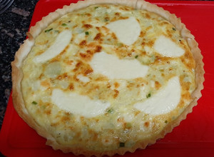Una foto de Tarta de cebolla y queso