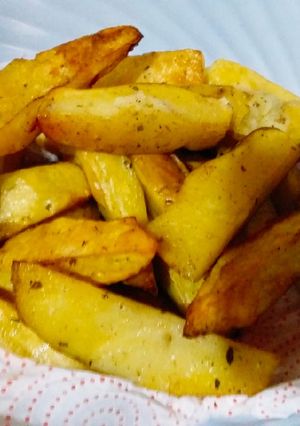 A picture of Spicy potato wedges.