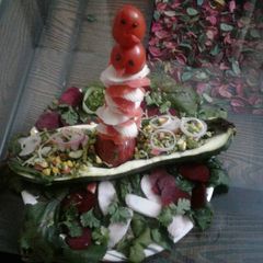Mix veg boat salad A picture of Mix veg boat salad.