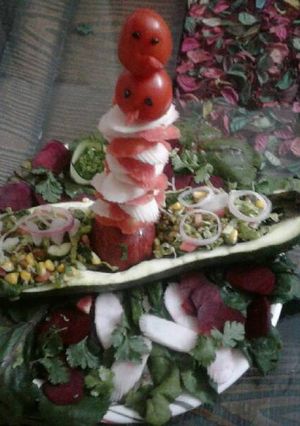 A picture of Mix veg boat salad.