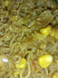 A picture of Maggi with corn.