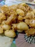 Ñoquis con coliflor salteados