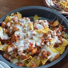A picture of Chicken fajitas nachos.