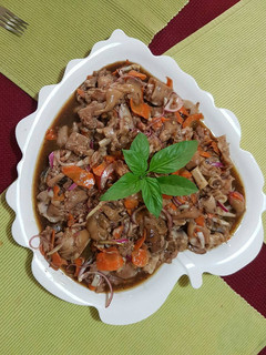 Una foto de Manitas de puerco a la Tica