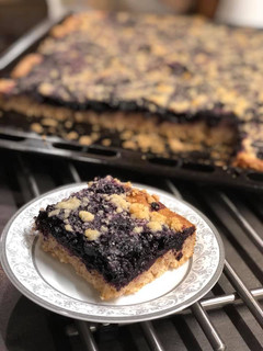 Una foto de Pastel de arándanos con streusel
