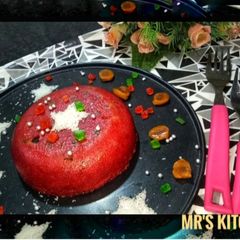 A picture of Red Velvet Cake with Strawberry and Coconut flavour (Eggless).
