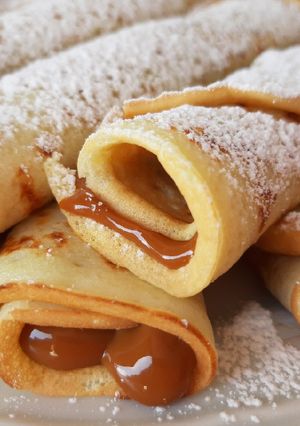 Una foto de Panqueques con dulce de leche 🇦🇷
