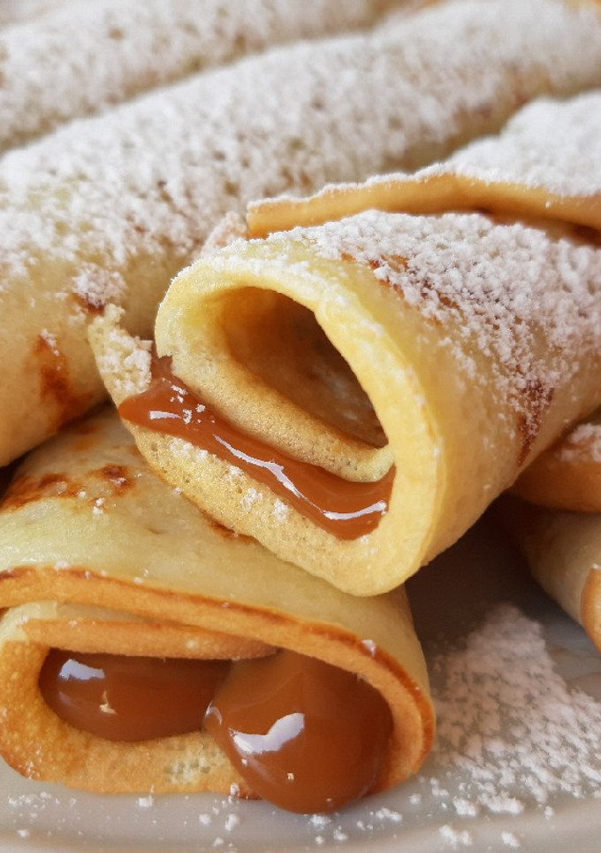Una foto de Panqueques con dulce de leche 🇦🇷