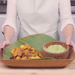 A picture of Avocado cream with sweet potato chips.