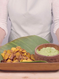 A picture of Avocado cream with sweet potato chips.