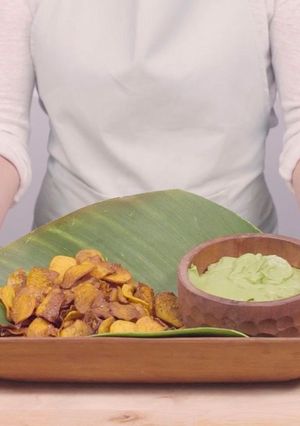 A picture of Avocado cream with sweet potato chips.