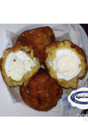 A picture of Egg in potato.