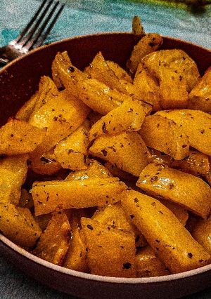 Une photo de Patates au four à la grecque (patates sto fourno)