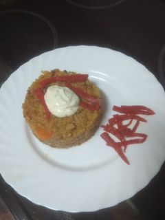 Una foto de Arroz con chocos y mejillones con alioli