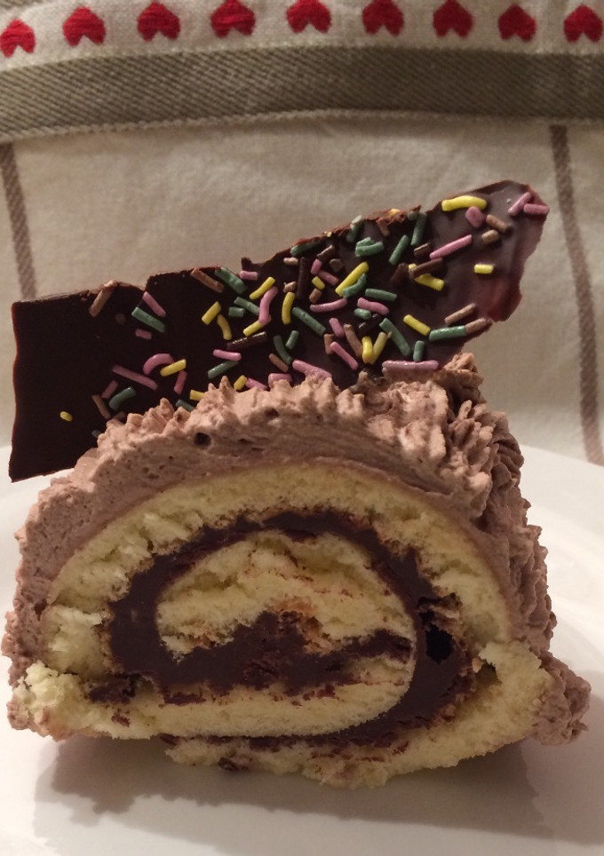 Una foto de Tronco de Navidad con chantilly de chocolate