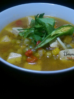 A picture of Tofu and vegetable soup.