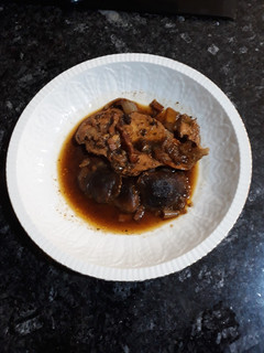 Una foto de Pollo al cava con salsa de soja y shiitakes