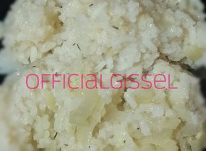 Una foto de Arroz con caldo de gallina