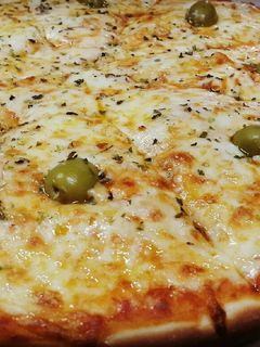 Una foto de Pizzas varias