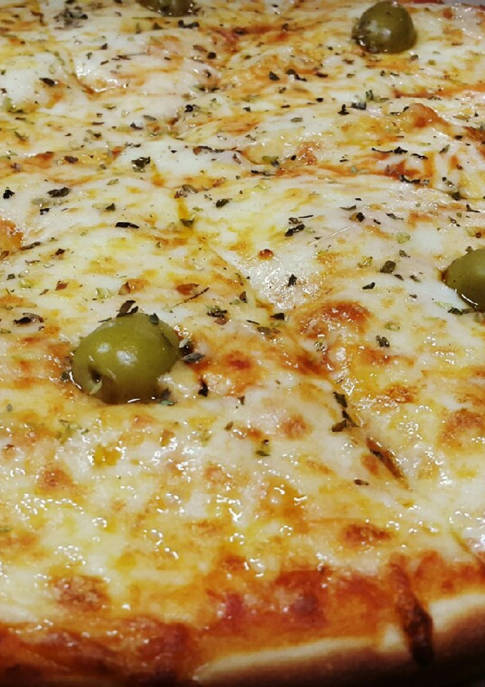 Una foto de Pizzas varias