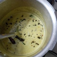 A picture of Moru curry / dahi curry.
