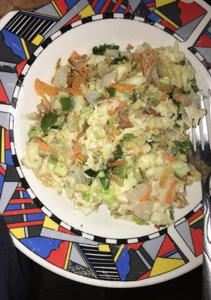 A picture of Fried eggs with cabbage.