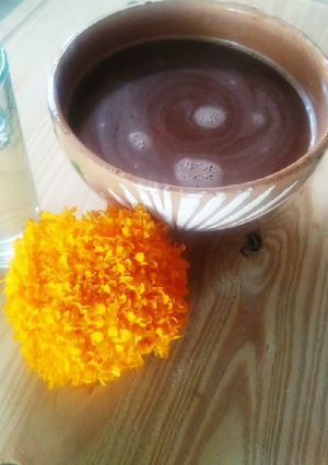 Una foto de Chocolate de leche con mezcal