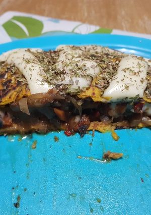 Una foto de Crepes de calabaza rellenos de vegetales salteados