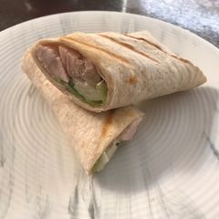 A picture of Chicken wrap with wasabi mayo.