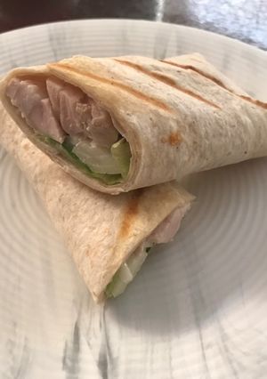 A picture of Chicken wrap with wasabi mayo.