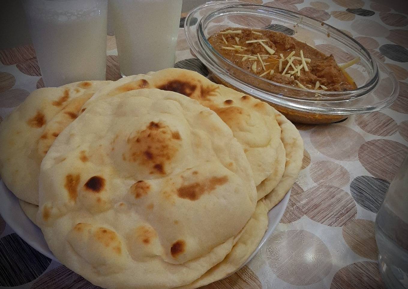 Chicken Qorma with homemade naans and lassi