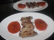Una foto de entomatado de costilla