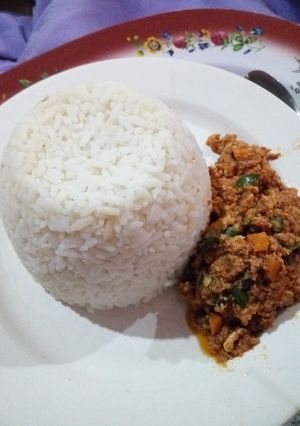 A picture of Buttered White Rice with Vegetable Egg Sauce.