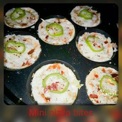 A picture of Mini pizza bites in aape pan.