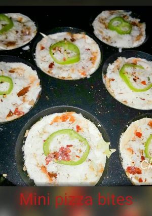 A picture of Mini pizza bites in aape pan.