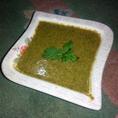 A picture of Restaurant style spicy green chutney.
