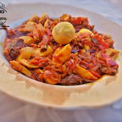 A picture of Fish and boiled egg sauce.