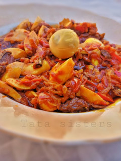 A picture of Fish and boiled egg sauce.