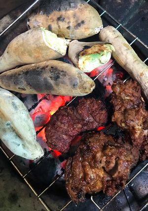 A picture of Roasted potatoes and meat.