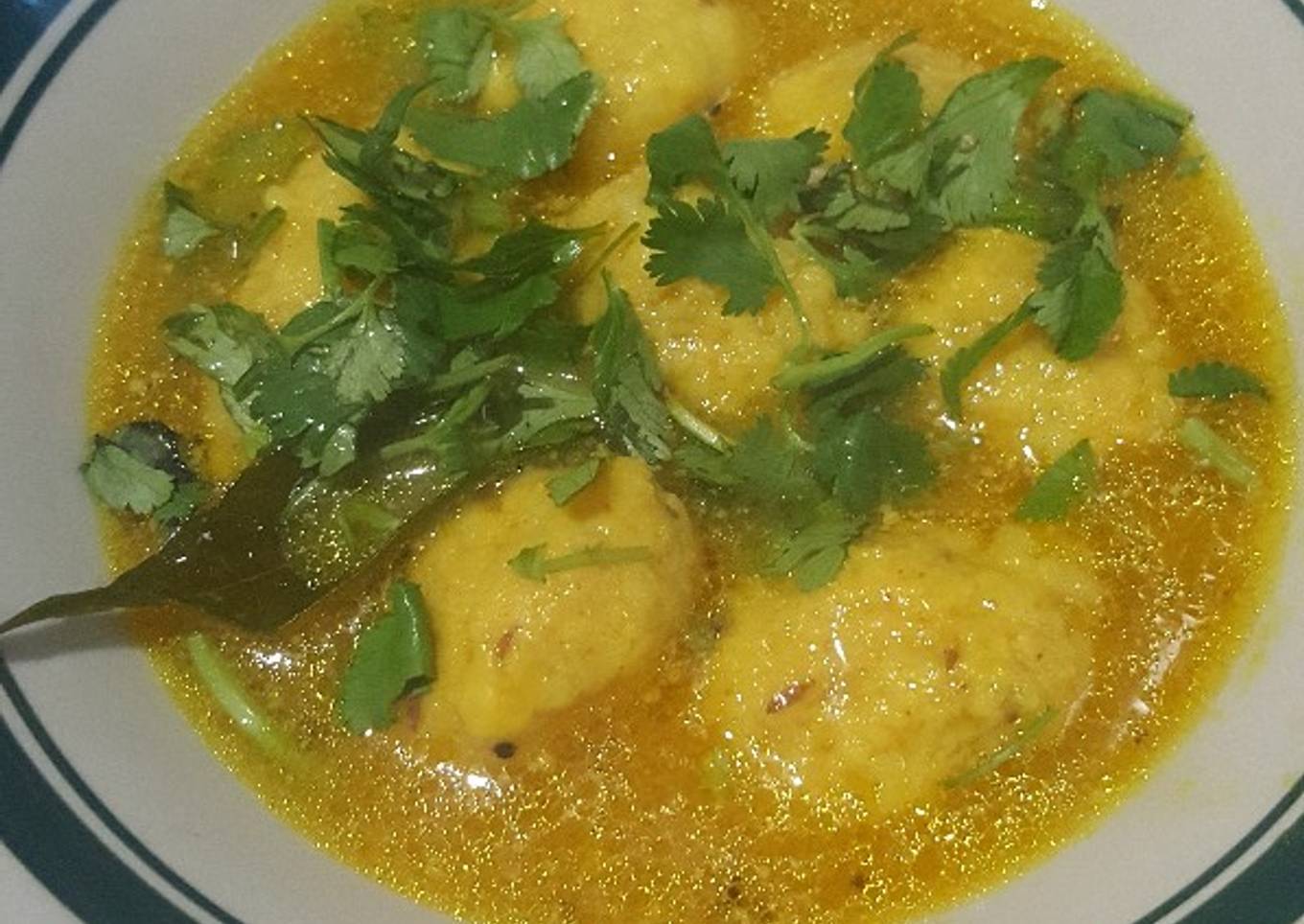 Rasiya muthiya (juicy rice ball)